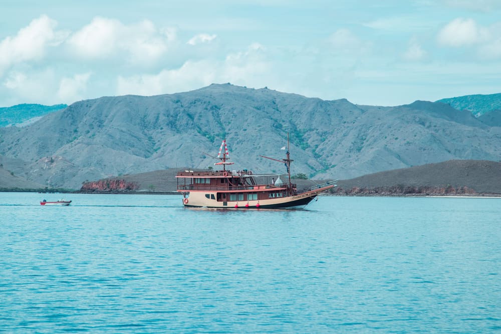 Traditional boats sailing near the islands of Komodo National Park